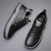 Chaussures en cuir a semelle haute