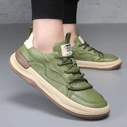 Chaussures en cuir a semelle haute